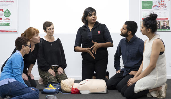 St John first aid training - trainer, students and manikin 