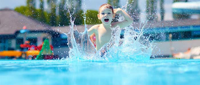 Child playing at water park