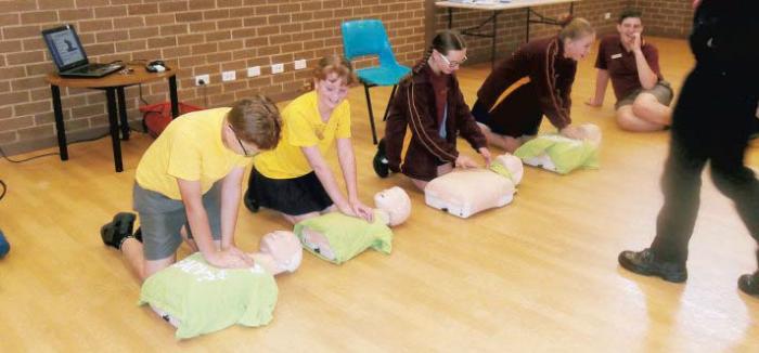St Kieran promoting health and wellbeing school children learning CPR