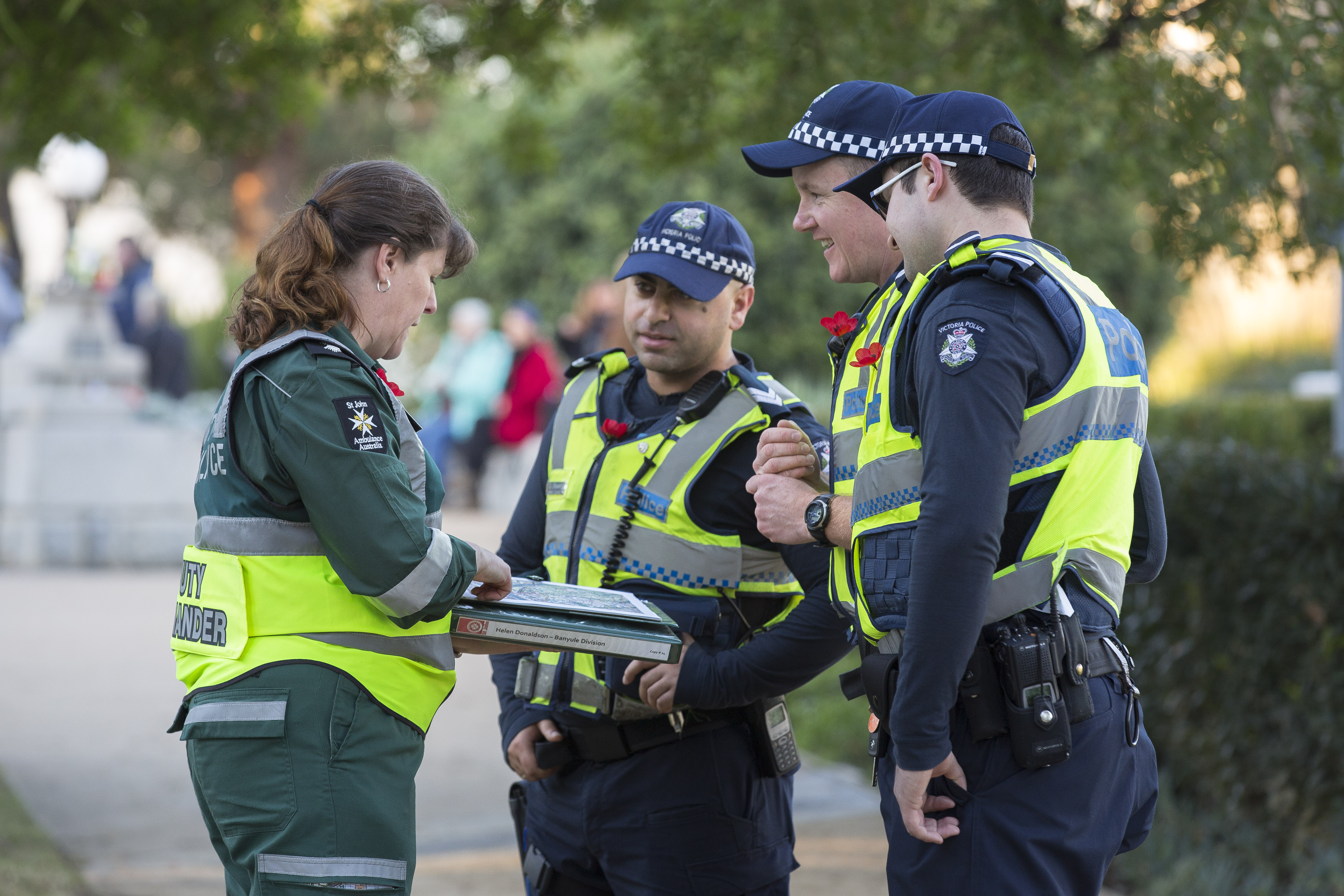 St John event volunteer working together with Victoria Police