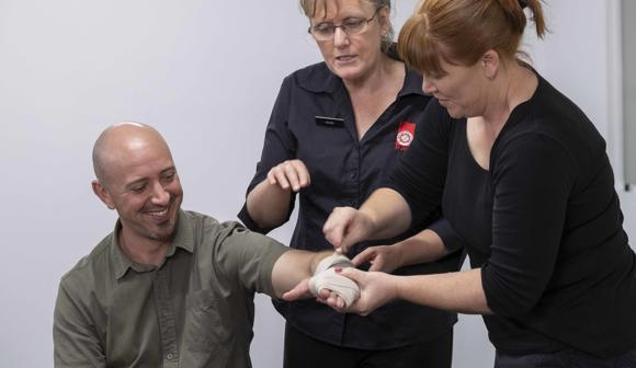 St John first aid training bandaging