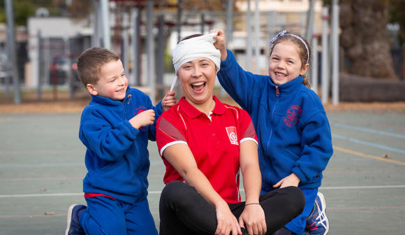 St John First Aid in Schools Program presenter with students
