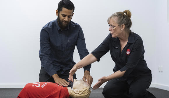 St John first aid training - trainer, student and manikin