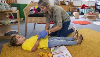 Education And Care First Aid Caring For Child At Early Learning Centre