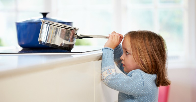 Child Pulling Down Saucepan