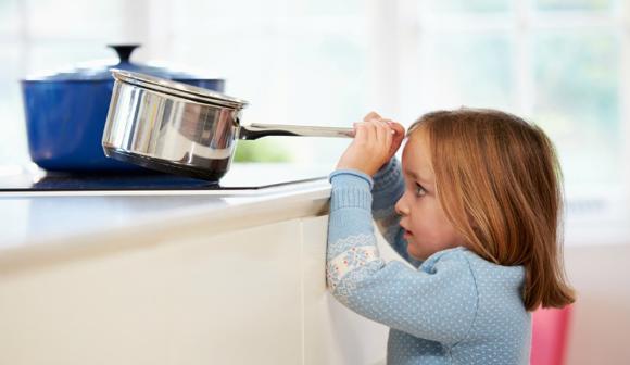 Child Pulling Down Saucepan