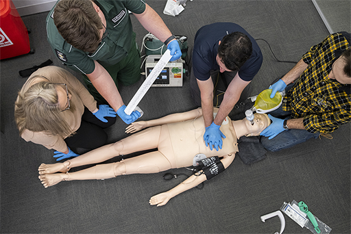 Diploma of emergency healthcare course St John Ambulance Victoria students performing life saving actions on mannikin