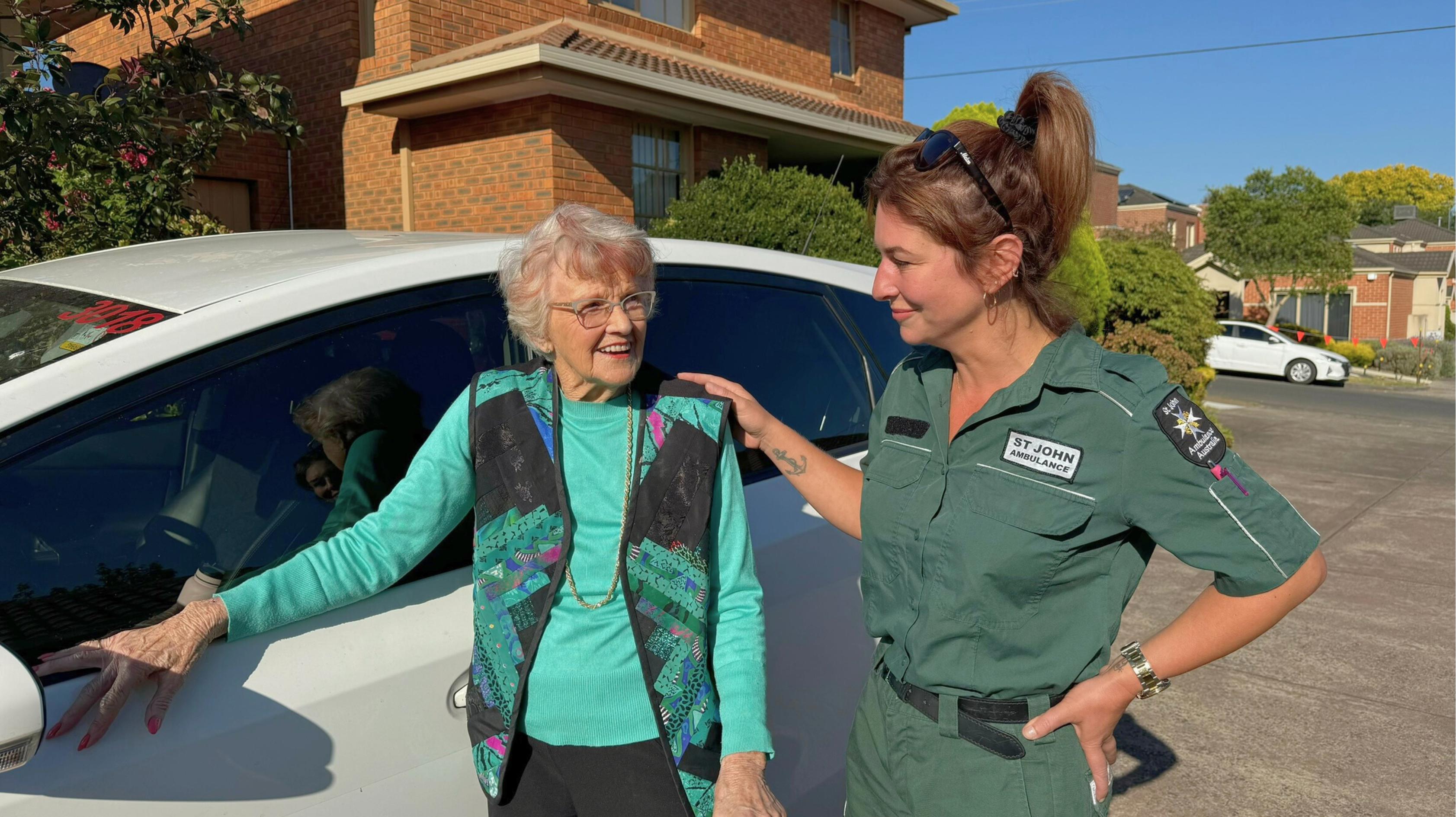 St John community transport service volunteer with 2 clients