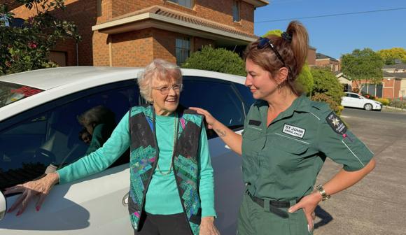 St John community transport service volunteer with 2 clients