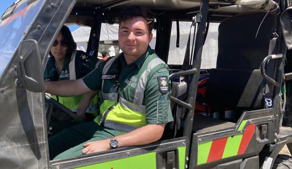 St John Ambulance VIC volunteers in a buggy at an event