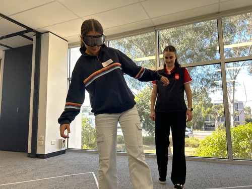 Party Ready Student Testing out Drunk Goggles